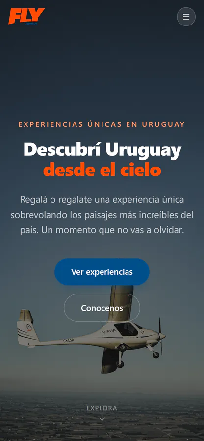 El inicio de fly.com.uy en un celular: «Descubrí Uruguay desde el cielo», el botón Ver experiencias y la avioneta en vuelo